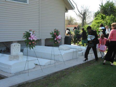 Memorial wreaths with casket